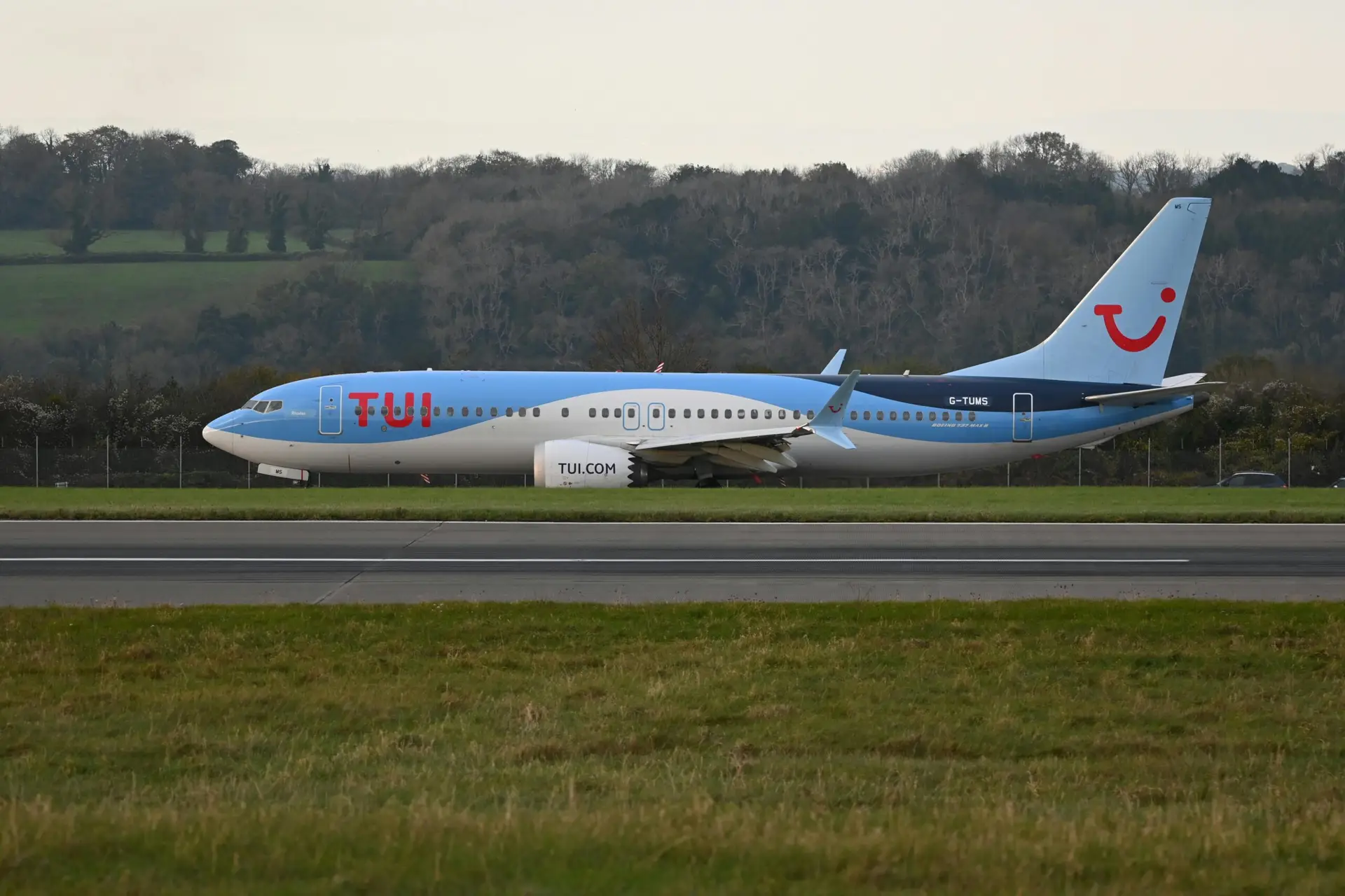 Tui airline jet on runway at airport